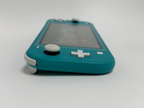 Игровая приставка Nintendo Switch Lite 32GB Бирюзовый SN:XJJ70029555201 (Б/У) фото 6